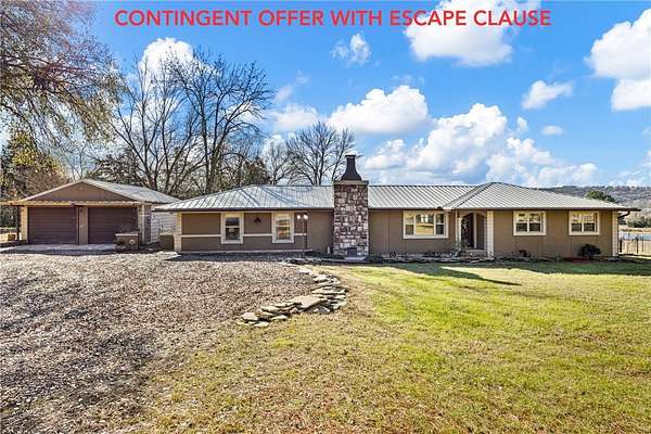 4.49 Acres of Land with Home for Sale in Russellville, Arkansas