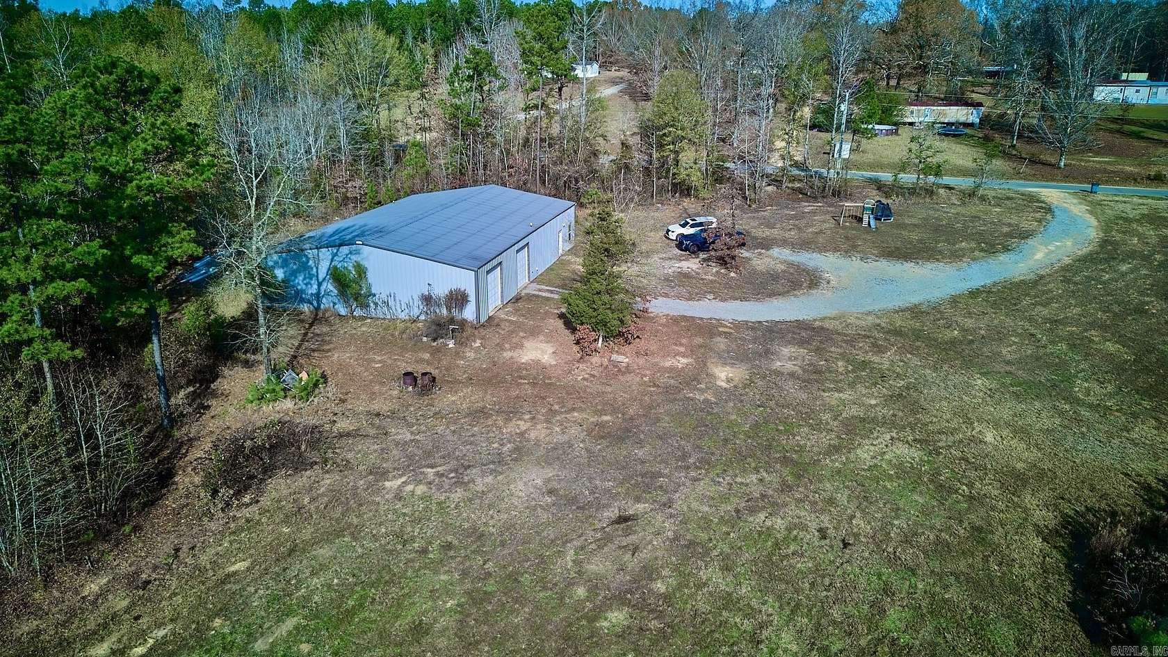 30.6 Acres of Land with Home for Sale in Bauxite, Arkansas