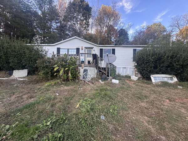 4 Acres of Residential Land with Home for Sale in Etowah, Tennessee