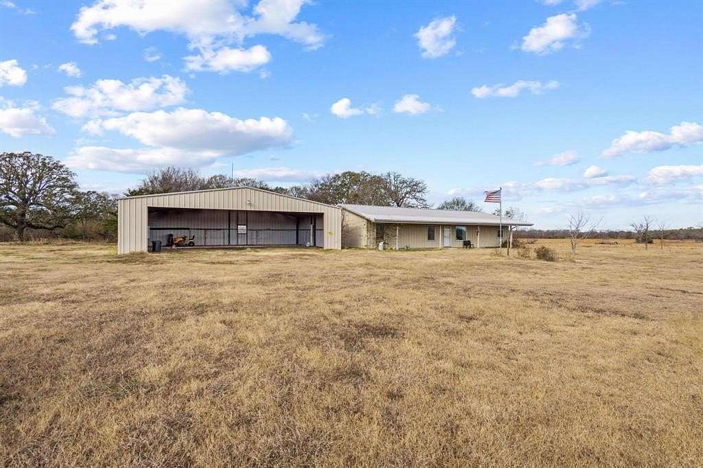 1.9 Acres of Residential Land with Home for Sale in Honey Grove, Texas