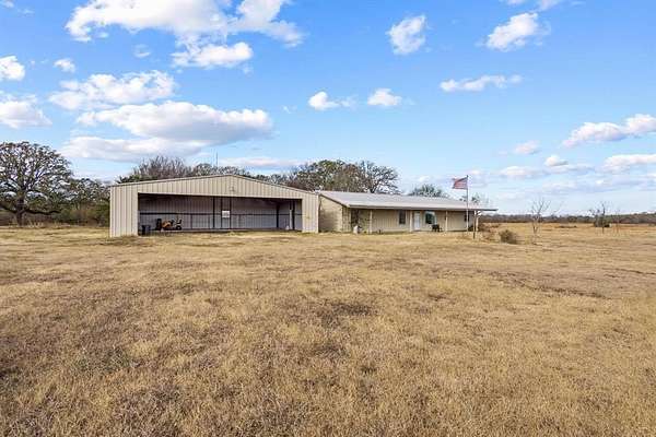 1.9 Acres of Residential Land with Home for Sale in Honey Grove, Texas