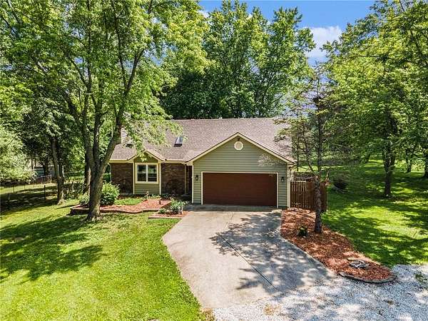 3.79 Acres of Residential Land with Home for Sale in Raymore, Missouri