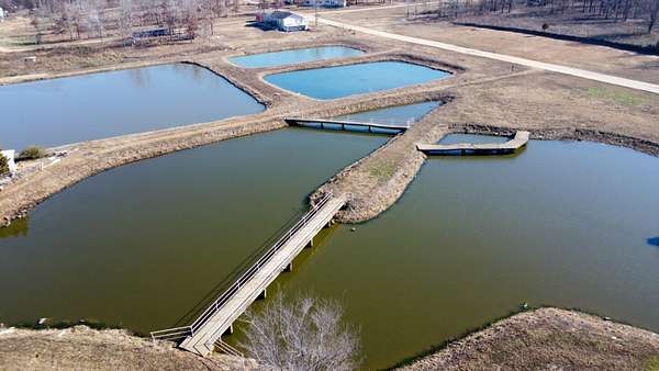 30 Acres of Commercial Land for Sale in Fairdealing, Missouri