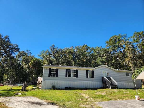 5 Acres of Residential Land with Home for Sale in Brooksville, Florida
