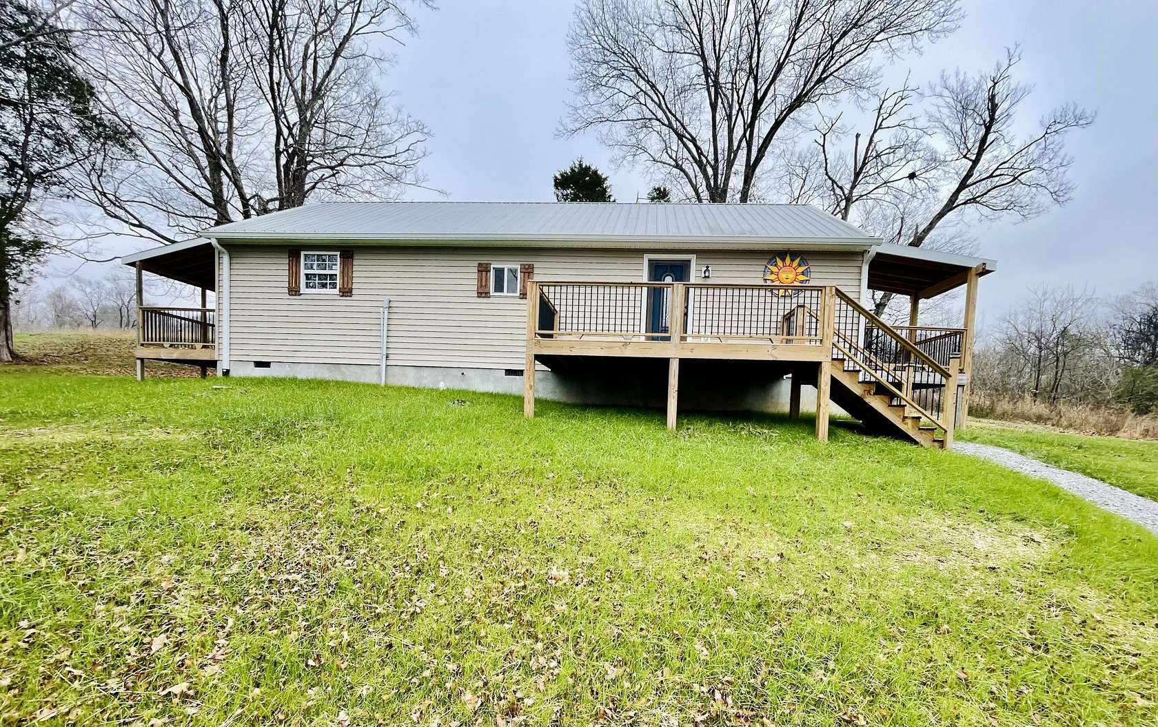 2.3 Acres of Residential Land with Home for Sale in Charlotte, Tennessee