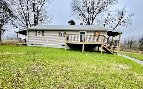 2.3 Acres of Residential Land with Home for Sale in Charlotte, Tennessee