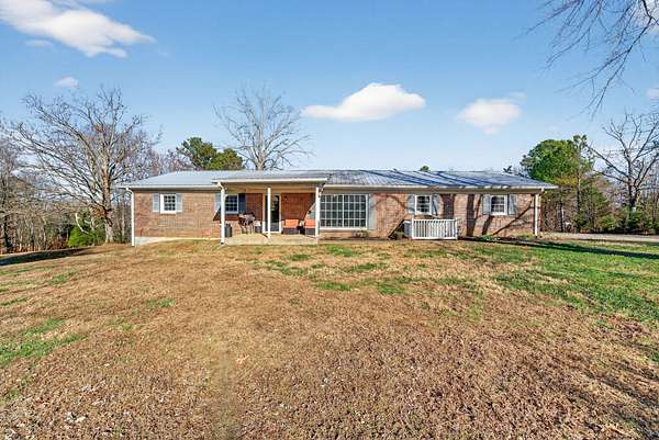 9.39 Acres of Residential Land with Home for Sale in Centerville, Tennessee