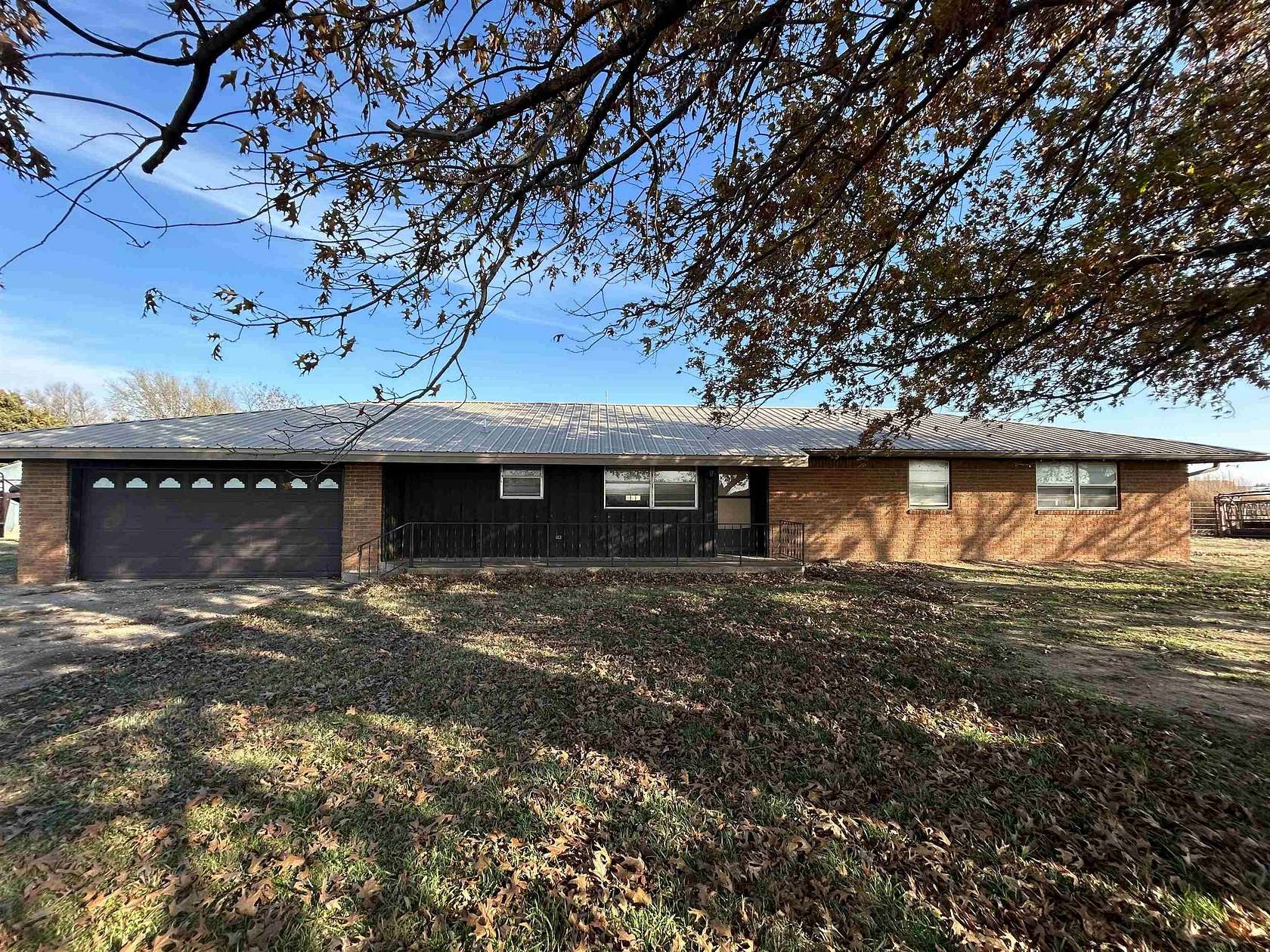 2.3 Acres of Residential Land with Home for Sale in Enid, Oklahoma