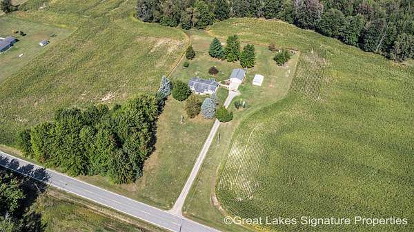 2 Acres of Residential Land with Home for Sale in Pierson, Michigan