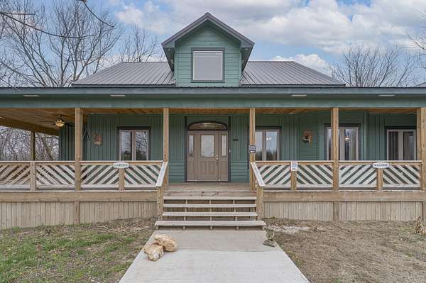 7.64 Acres of Residential Land with Home for Sale in Aldrich, Missouri