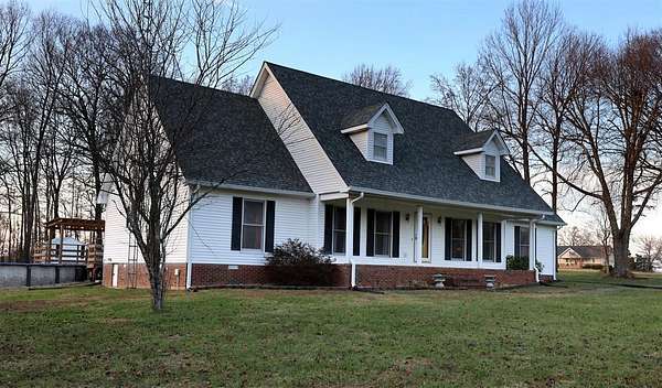 9.63 Acres of Land with Home for Sale in Glasgow, Kentucky