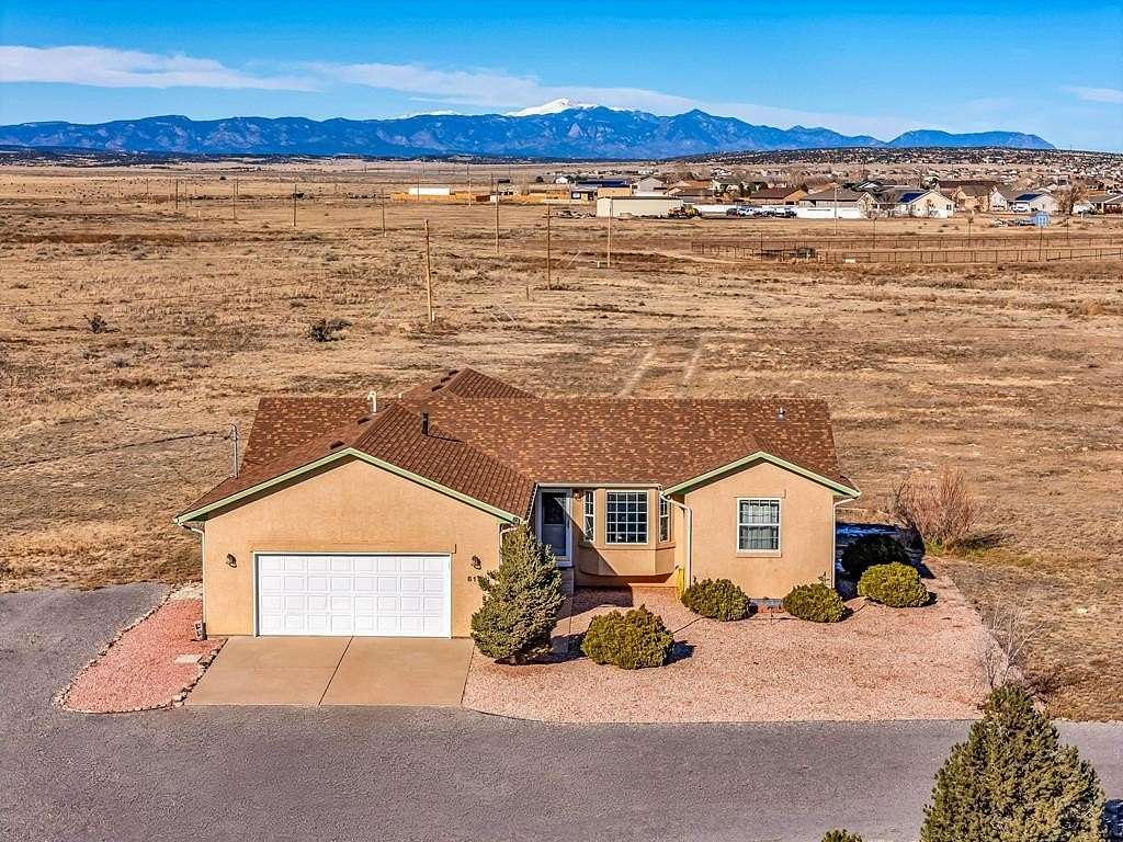 2.67 Acres of Residential Land with Home for Sale in Pueblo West, Colorado