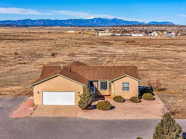 2.67 Acres of Residential Land with Home for Sale in Pueblo West, Colorado