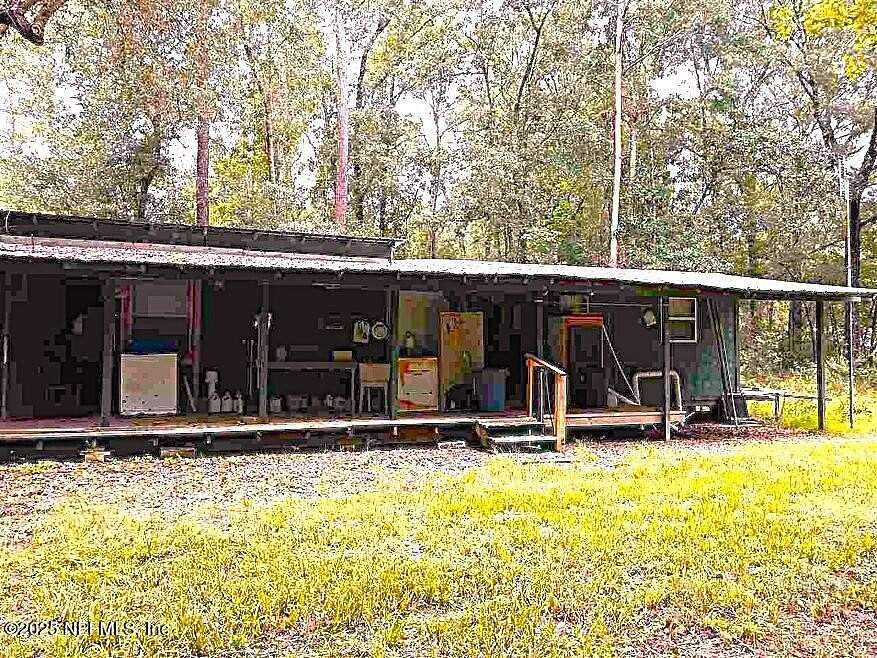 4 Acres of Residential Land with Home for Sale in Perry, Florida