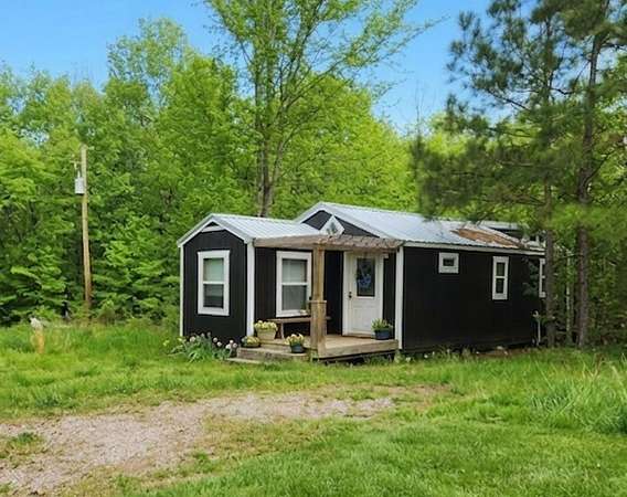 3 Acres of Land with Home for Sale in Adamsville, Tennessee