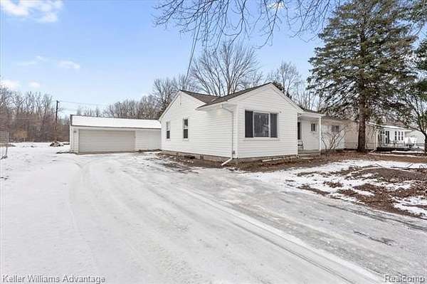 2 Acres of Residential Land with Home for Sale in New Boston, Michigan