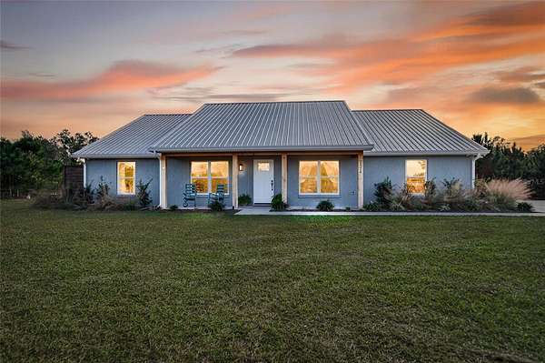 5 Acres of Residential Land with Home for Sale in Eustis, Florida