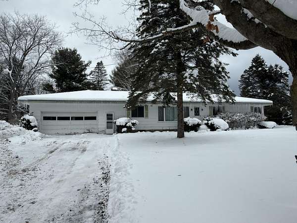 2.5 Acres of Residential Land with Home for Sale in New Era, Michigan