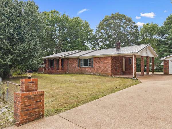 2 Acres of Residential Land with Home for Sale in Coalmont, Tennessee