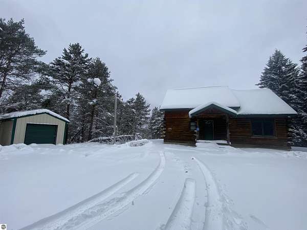 2.7 Acres of Residential Land with Home for Sale in Manton, Michigan