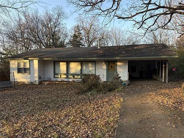 0.5 Acres of Residential Land with Home for Sale in Fayetteville, Arkansas