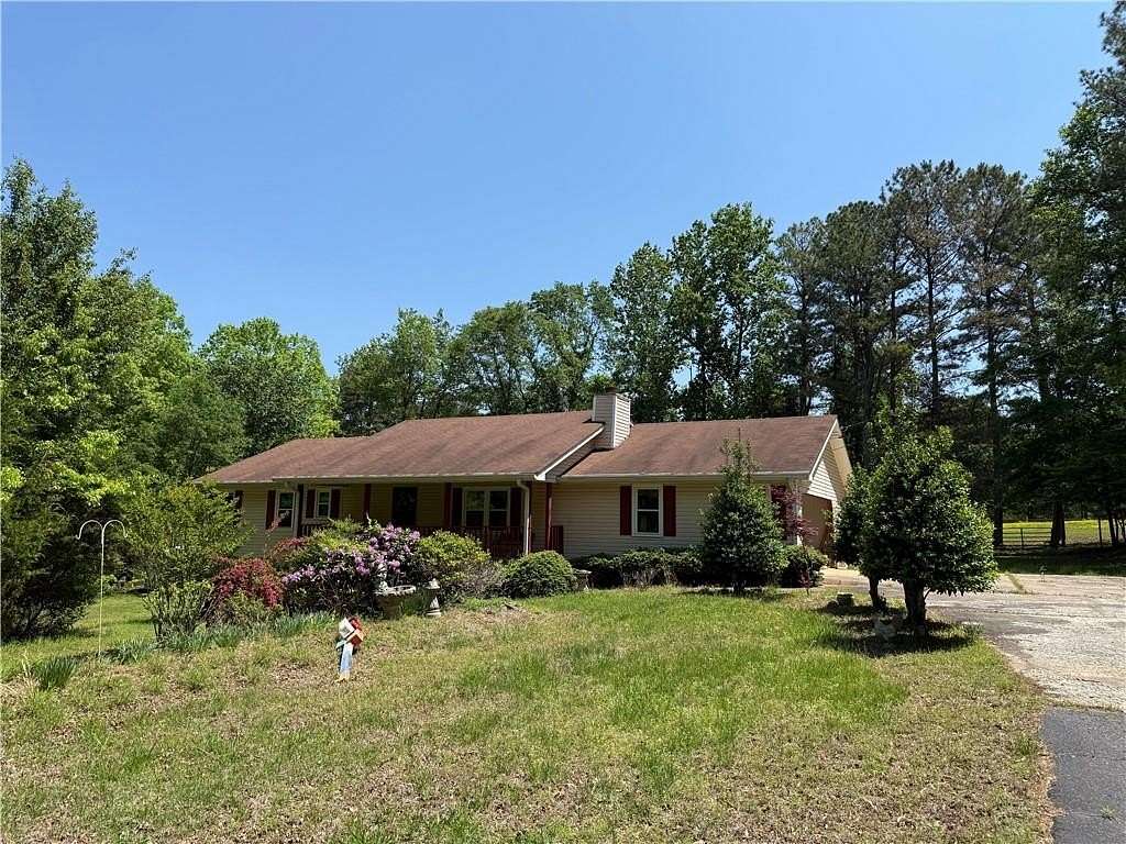 5.26 Acres of Residential Land with Home for Sale in Cumming, Georgia