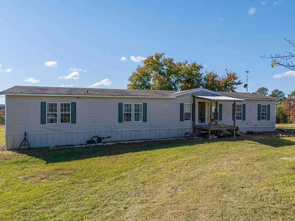 117 Acres of Land with Home for Sale in Marshall, Texas