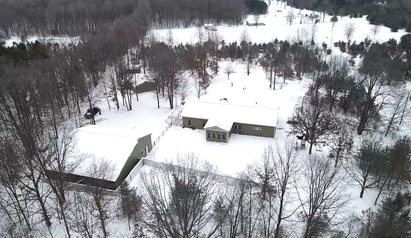 18 Acres of Recreational Land with Home for Sale in Manton, Michigan