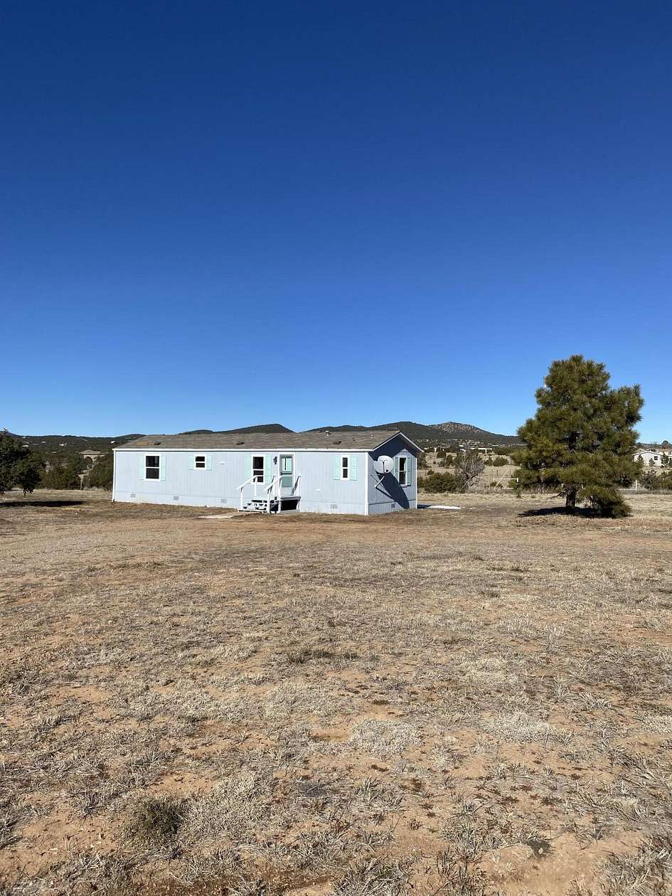10 Acres of Residential Land with Home for Lease in Sandia Park, New Mexico