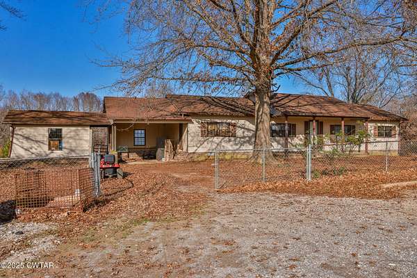 4.27 Acres of Residential Land with Home for Sale in Cottage Grove, Tennessee