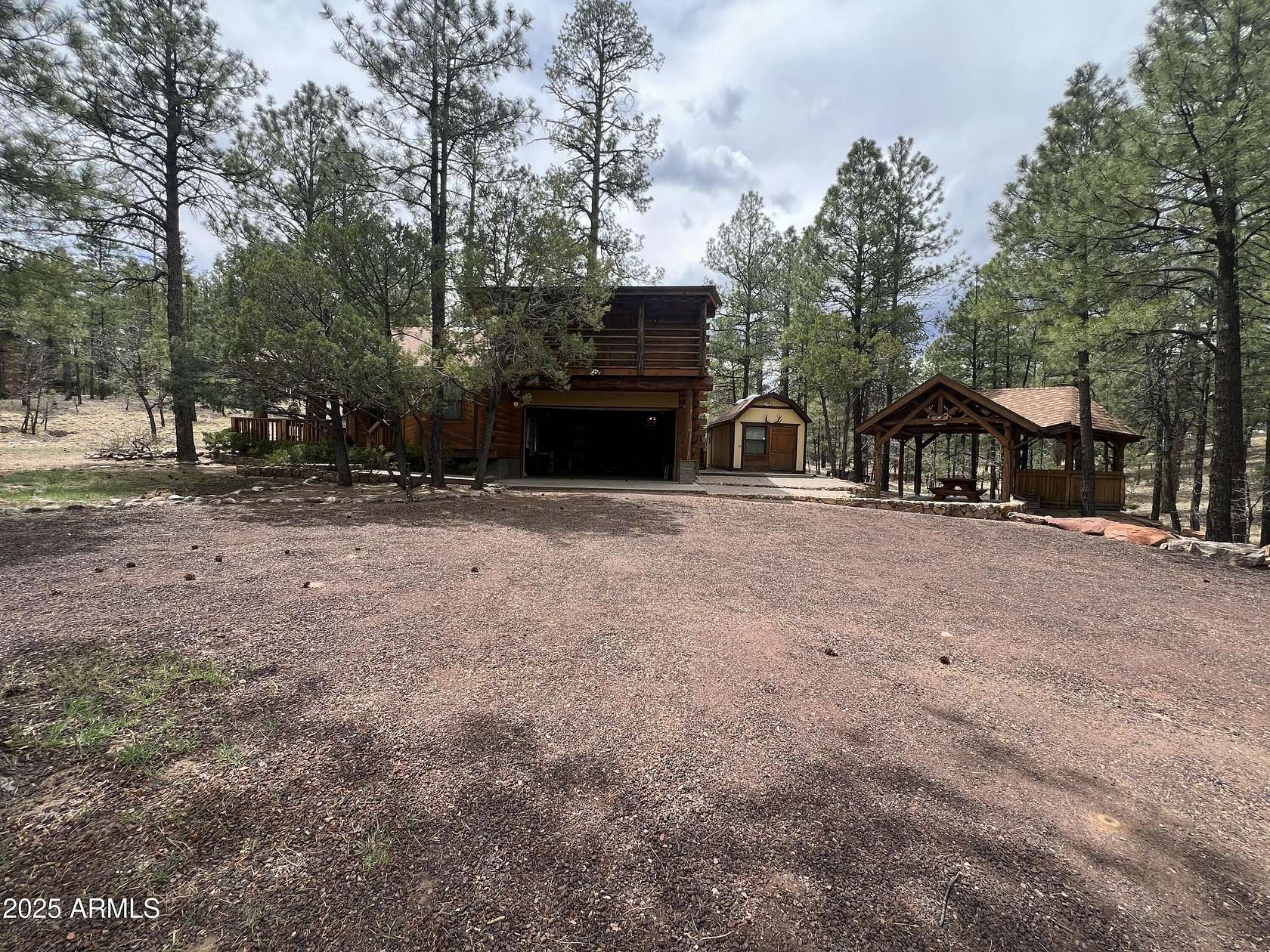 4 Acres of Residential Land with Home for Sale in Show Low, Arizona