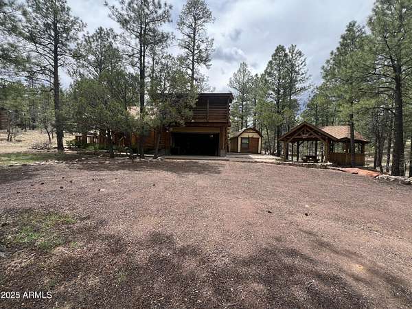 4 Acres of Residential Land with Home for Sale in Show Low, Arizona