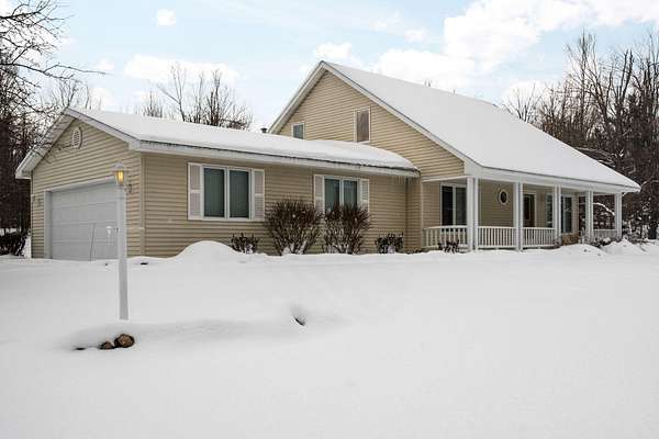 20 Acres of Recreational Land with Home for Sale in Vanderbilt, Michigan