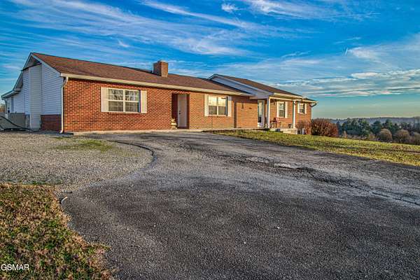 15.7 Acres of Land with Home for Sale in Philadelphia, Tennessee