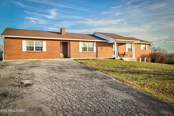 15.7 Acres of Land with Home for Sale in Philadelphia, Tennessee