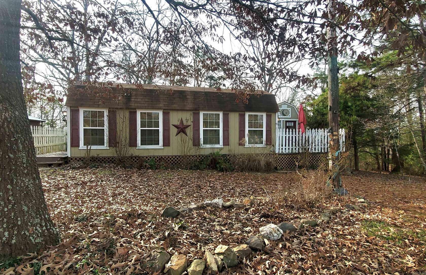 10 Acres of Residential Land with Home for Sale in Cove, Arkansas