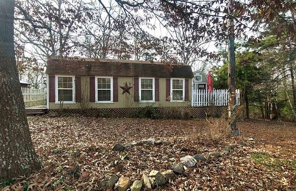 10 Acres of Residential Land with Home for Sale in Cove, Arkansas