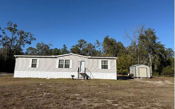 4.6 Acres of Residential Land with Home for Sale in O'Brien, Florida