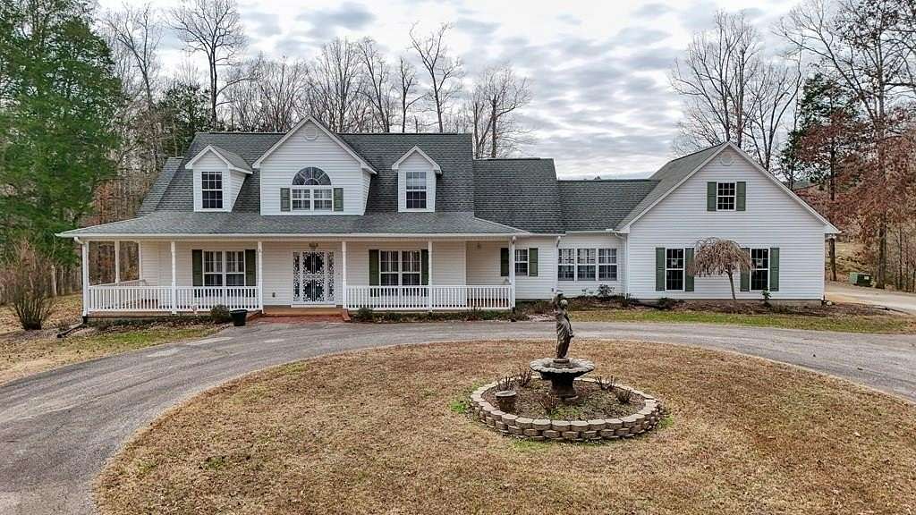 10.9 Acres of Land with Home for Sale in Jackson, Tennessee