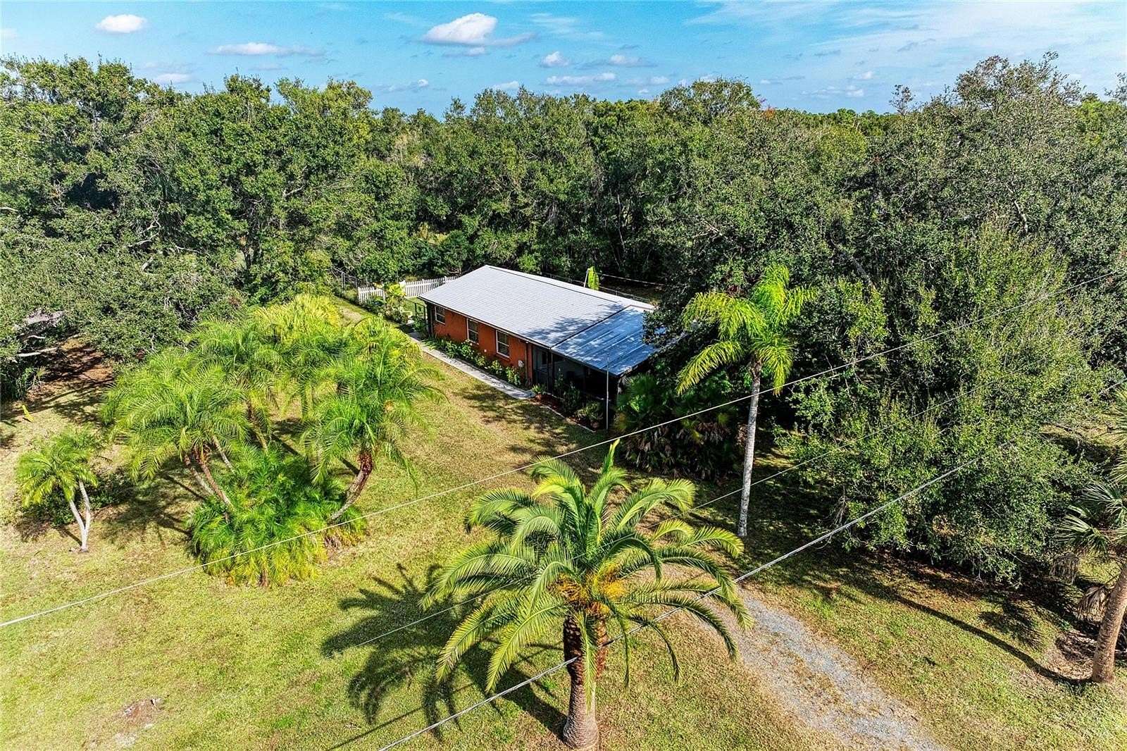 4.7 Acres of Residential Land with Home for Sale in Englewood, Florida
