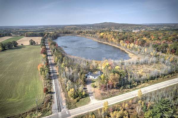 5 Acres of Residential Land with Home for Sale in Vulcan, Michigan