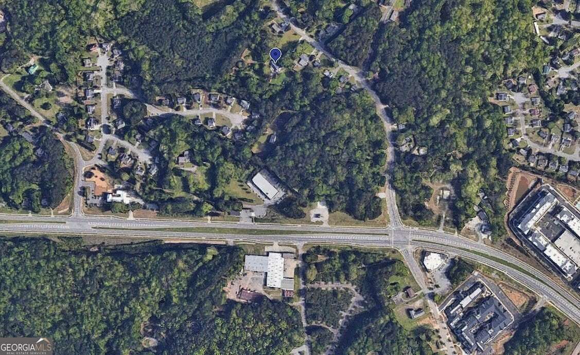 3.44 Acres of Residential Land with Home for Sale in Sugar Hill, Georgia