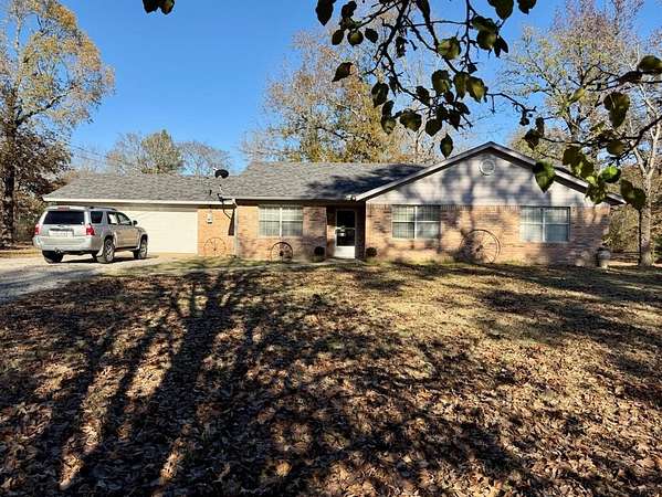 3.8 Acres of Residential Land with Home for Sale in Blossom, Texas