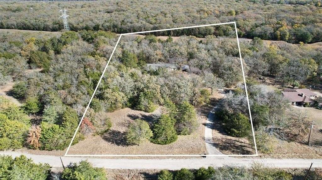 5.8 Acres of Residential Land with Home for Sale in Terrell, Texas