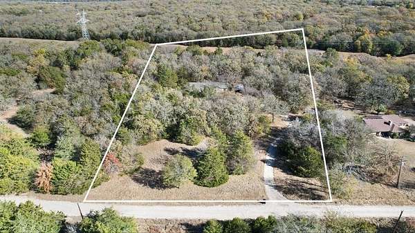 5.8 Acres of Residential Land with Home for Sale in Terrell, Texas