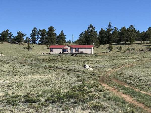 5 Acres of Residential Land with Home for Sale in Hartsel, Colorado