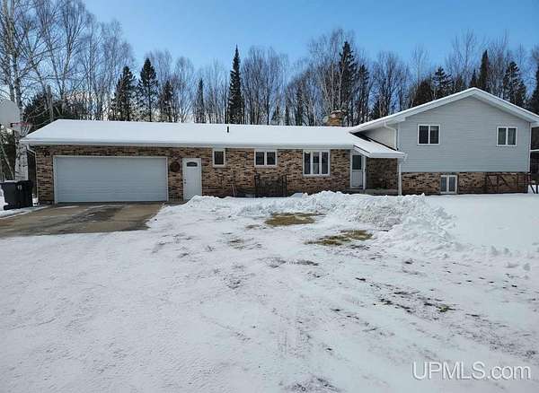 7.5 Acres of Residential Land with Home for Sale in Gladstone, Michigan