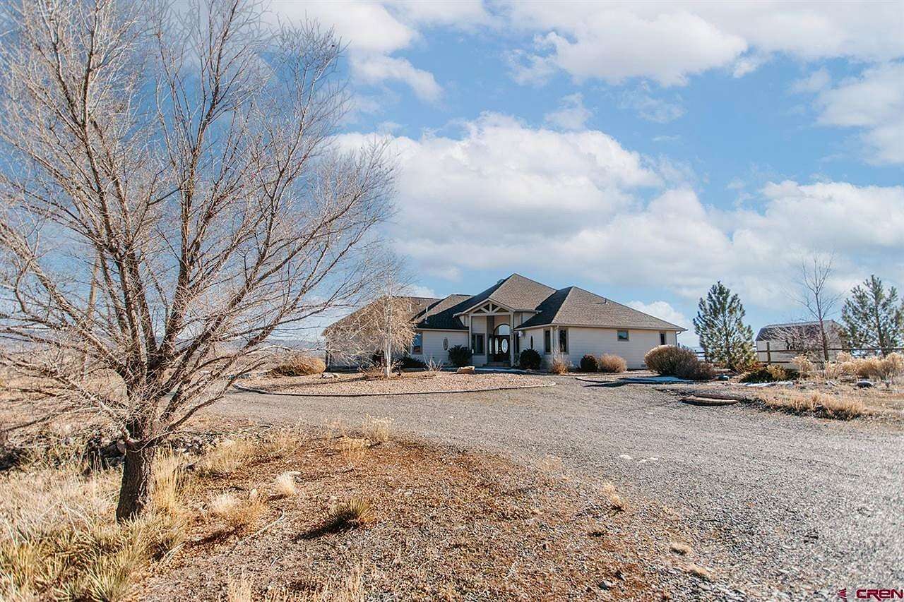 4.2 Acres of Residential Land with Home for Sale in Olathe, Colorado