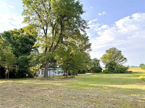 2 Acres of Residential Land with Home for Sale in Cookville, Texas