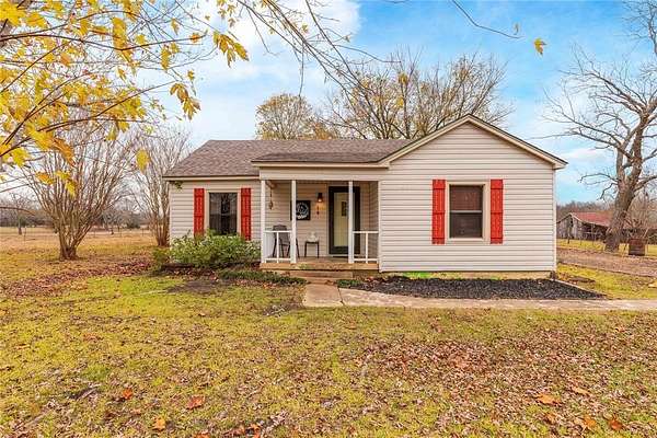 2.77 Acres of Residential Land with Home for Sale in Wolfe City, Texas